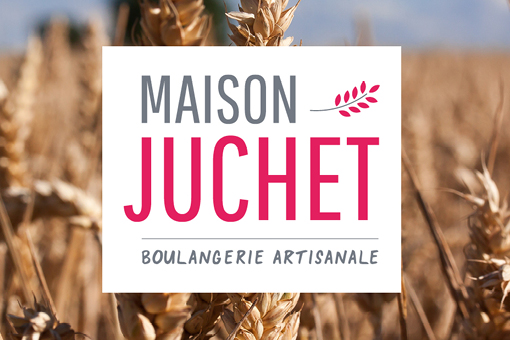 Logo Maison Juchet sur fond de blés